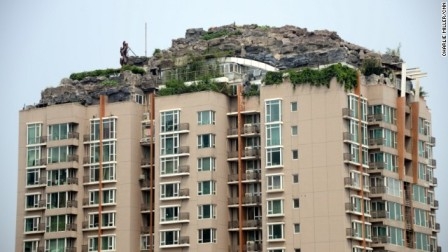 Beijing man builds apartment top mountain-