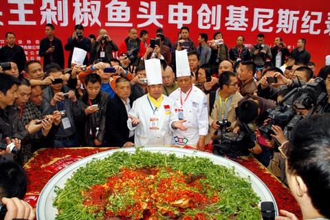 A giant dish of steamed fish head : An attraction in Chinese Chef Festival in Changsha, Hunan