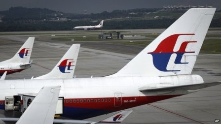 Malaysia Airlines with 239 aboard missing , presumed crashed