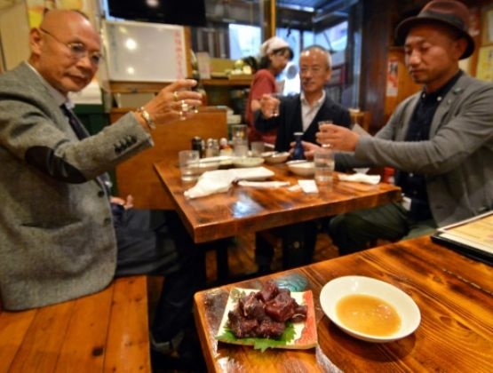 Tokyo district tries to reel in tourists with whale meat
