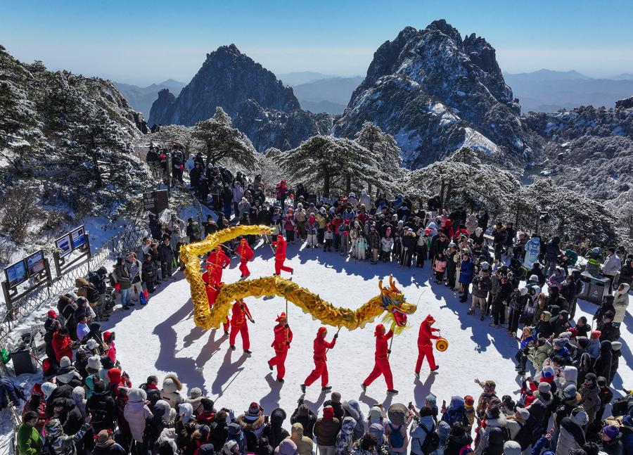 Chinese celebrate Spring Festival with traditions, travels , shopping spree